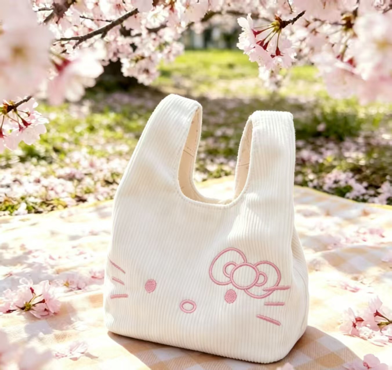 1 White corduroy Kitty cat embroidery handbag portable and high-value wrist bag, Hello Kitty handbag - Image 1